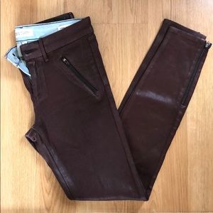 Waxed burgundy jeans